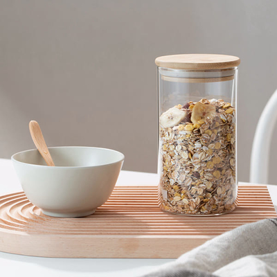 Tarro transparente de 25 de la onza de Borosilicate contenedores de almacenamiento del vidrio con la tapa de bambú